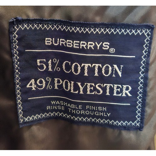 8 - Burberrys- A late 20th Century gents beige trench coat 46