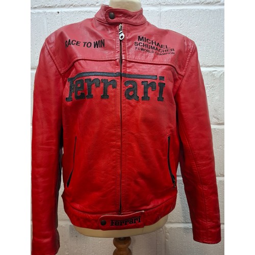 23 - A Top Gear red leather Ferrari racing jacket having Michael Schumacher F1 World Champion in writing ... 