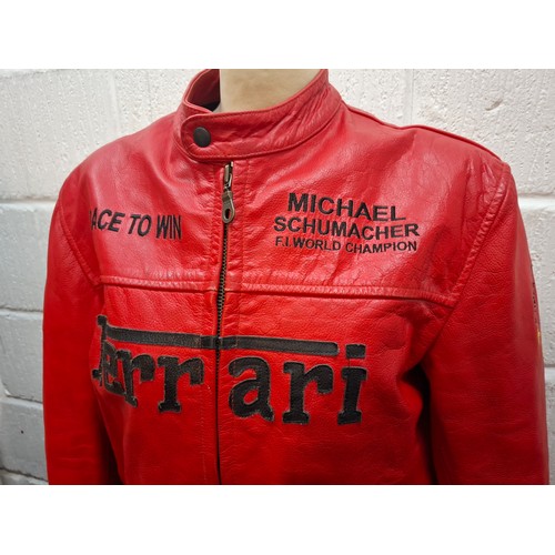 23 - A Top Gear red leather Ferrari racing jacket having Michael Schumacher F1 World Champion in writing ... 