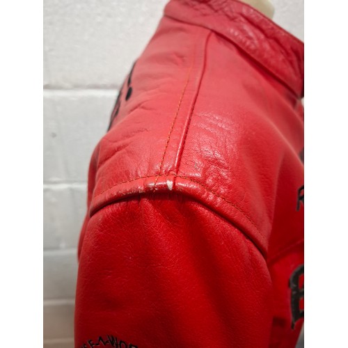 23 - A Top Gear red leather Ferrari racing jacket having Michael Schumacher F1 World Champion in writing ... 
