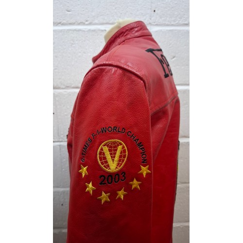 23 - A Top Gear red leather Ferrari racing jacket having Michael Schumacher F1 World Champion in writing ... 