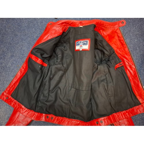 23 - A Top Gear red leather Ferrari racing jacket having Michael Schumacher F1 World Champion in writing ... 