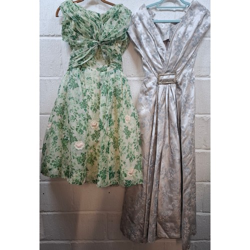 20 - Two vintage dresses comprising a mid 20th Century Forelle Cappa green netted tea length dress A/F wi... 