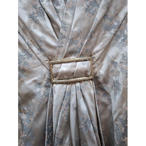 20 - Two vintage dresses comprising a mid 20th Century Forelle Cappa green netted tea length dress A/F wi... 