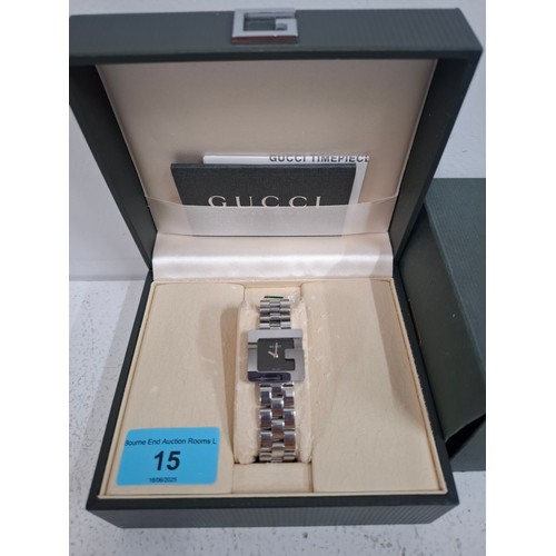 15 - Gucci- A ladies G-Face stainless steel watch with black dial, model no:3600L and original branded wa... 