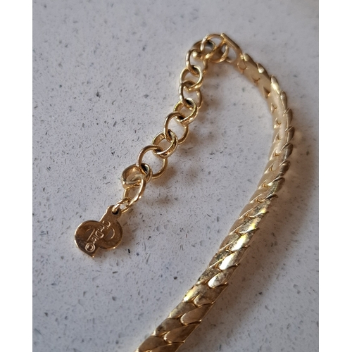 1 - Christian Dior- A matched jewellery suite comprising a yellow tone necklace with central opaque crea... 