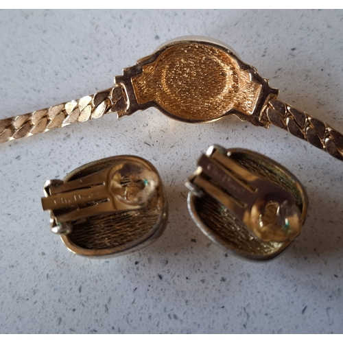 1 - Christian Dior- A matched jewellery suite comprising a yellow tone necklace with central opaque crea... 