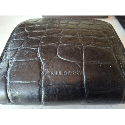 17 - Mulberry- A vintage black leather 'Congo' purse in a branded box (not original to the purse), a blac... 