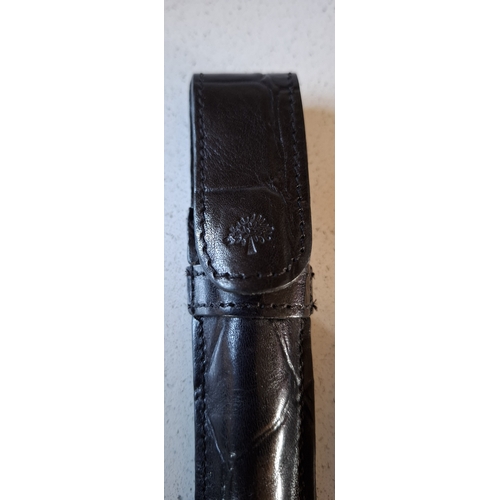 17 - Mulberry- A vintage black leather 'Congo' purse in a branded box (not original to the purse), a blac... 
