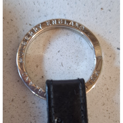 17 - Mulberry- A vintage black leather 'Congo' purse in a branded box (not original to the purse), a blac... 