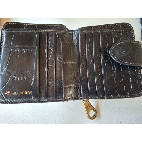 17 - Mulberry- A vintage black leather 'Congo' purse in a branded box (not original to the purse), a blac... 