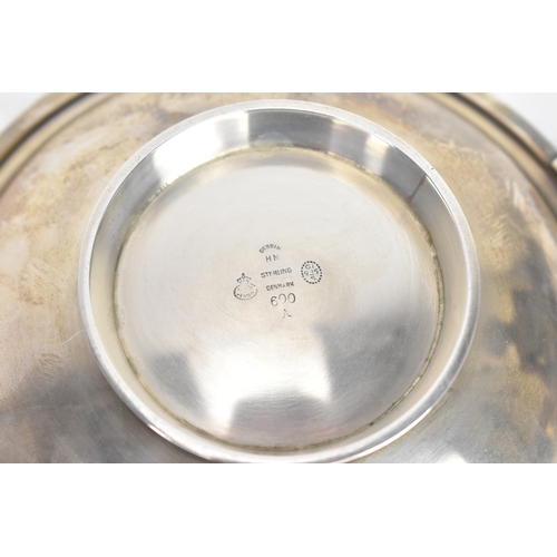 110 - Georg Jensen - a sterling silver 'Pyramid' round dish, having a polished shallow bowl with stepped f... 