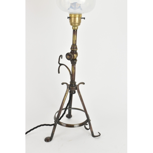 13 - An early 20th century Pullman railway carriage lamp, the adjustable column with wrought metal tripod... 