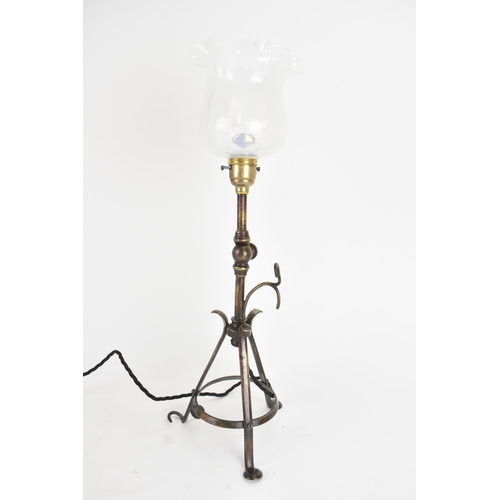13 - An early 20th century Pullman railway carriage lamp, the adjustable column with wrought metal tripod... 