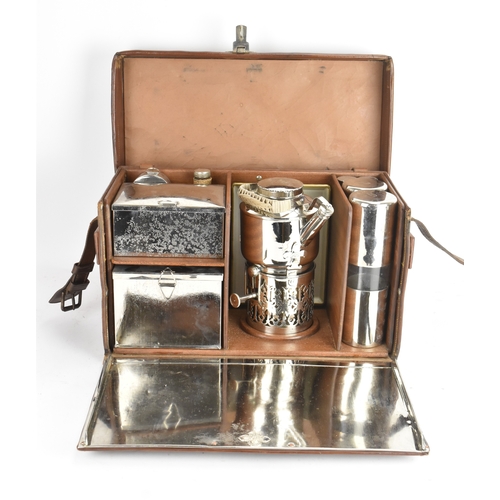 179 - An early 20th century Drew & Sons Picadilly Circus 'En Route' picnic set,  in a brown leather travel... 