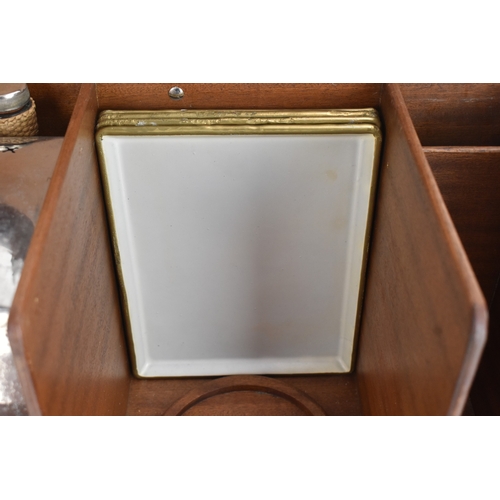 179 - An early 20th century Drew & Sons Picadilly Circus 'En Route' picnic set,  in a brown leather travel... 