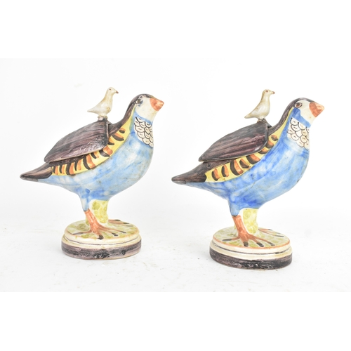 180 - A pair of 18th-century Alcora Talavera faience partridge tureens, circa 1790, with original domed co... 