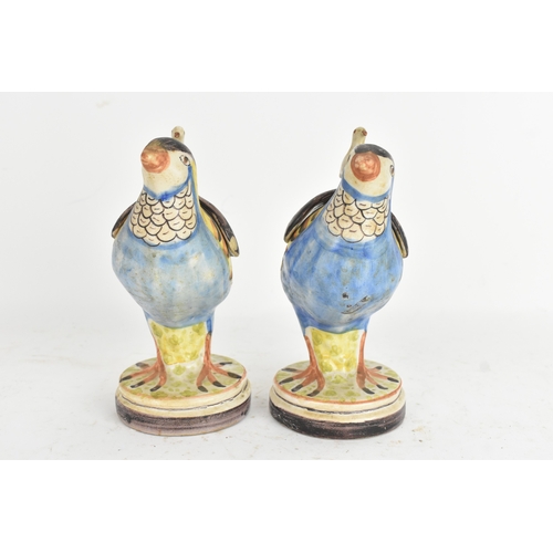 180 - A pair of 18th-century Alcora Talavera faience partridge tureens, circa 1790, with original domed co... 