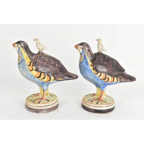 180 - A pair of 18th-century Alcora Talavera faience partridge tureens, circa 1790, with original domed co... 