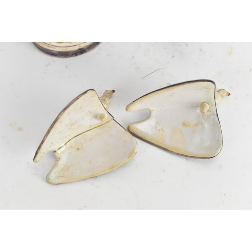 180 - A pair of 18th-century Alcora Talavera faience partridge tureens, circa 1790, with original domed co... 