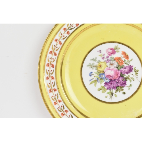 181 - An early 19th century Sèvres yellow-ground plate from a service given by Napoleon I to the comte de ... 
