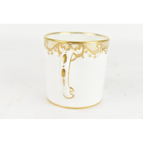 182 - A late 18th century Sèvres porcelain coffee can, decorated in gilt with a neoclassical frieze of scr... 