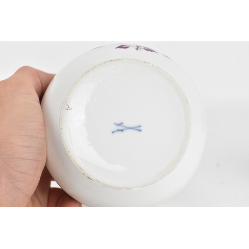 183 - An 18th century Meissen porcelain tea bowl and covered sugar bowl, decorated in puce with kakiemon f... 