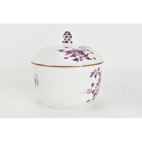 183 - An 18th century Meissen porcelain tea bowl and covered sugar bowl, decorated in puce with kakiemon f... 