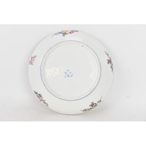 184 - An 18th century Sèvres porcelain lobed dish, painted with finely detailed scattered floral sprays wi... 