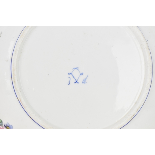 184 - An 18th century Sèvres porcelain lobed dish, painted with finely detailed scattered floral sprays wi... 