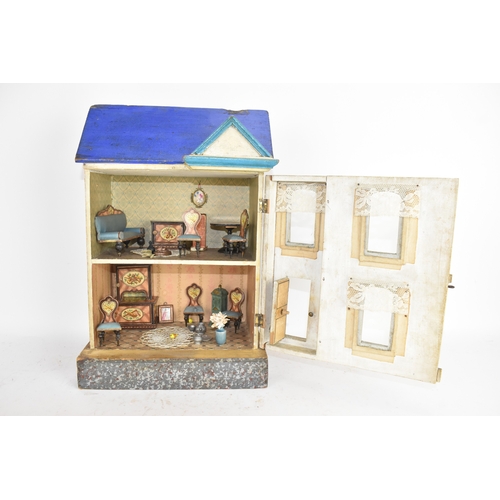 186 - An early 20th century furnished blue roof dollhouse made for the French Market by Moritz Gottschalk,... 