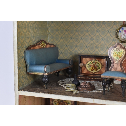 186 - An early 20th century furnished blue roof dollhouse made for the French Market by Moritz Gottschalk,... 
