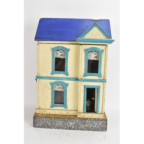 186 - An early 20th century furnished blue roof dollhouse made for the French Market by Moritz Gottschalk,... 