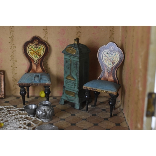 186 - An early 20th century furnished blue roof dollhouse made for the French Market by Moritz Gottschalk,... 