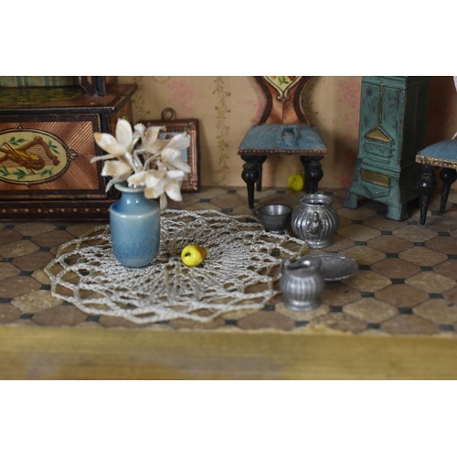 186 - An early 20th century furnished blue roof dollhouse made for the French Market by Moritz Gottschalk,... 