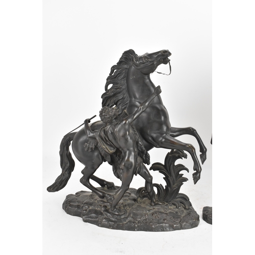 187 - A pair of late 19th/early 20th century French patinated bronze models of the Marly Horses, after Gui... 