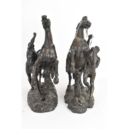 187 - A pair of late 19th/early 20th century French patinated bronze models of the Marly Horses, after Gui... 