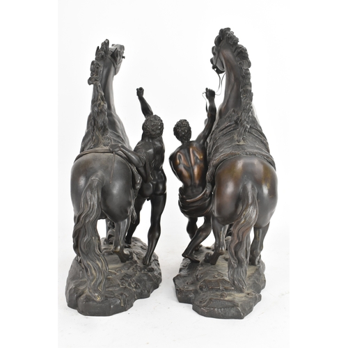 187 - A pair of late 19th/early 20th century French patinated bronze models of the Marly Horses, after Gui... 