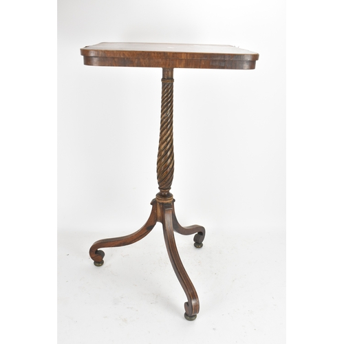 189 - A pair of Regency rosewood lamp tables, the rectangular tops with rounded corners, raised on spiral-... 