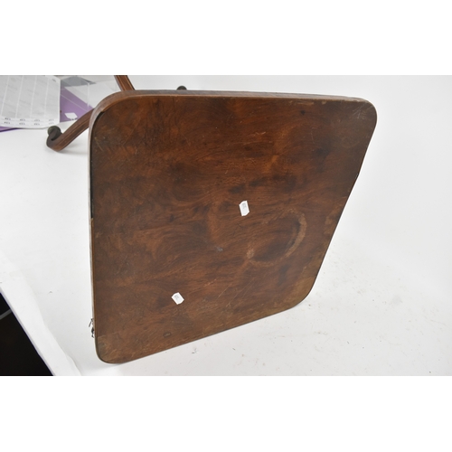 189 - A pair of Regency rosewood lamp tables, the rectangular tops with rounded corners, raised on spiral-... 