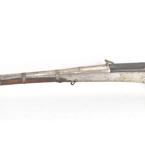 192 - A 19th century Indian toradar matchlock musket, the long steel barrel engraved with inscription, the... 