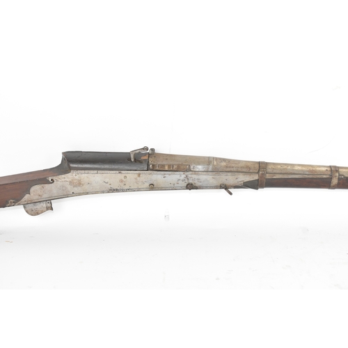 192 - A 19th century Indian toradar matchlock musket, the long steel barrel engraved with inscription, the... 