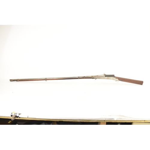 192 - A 19th century Indian toradar matchlock musket, the long steel barrel engraved with inscription, the... 
