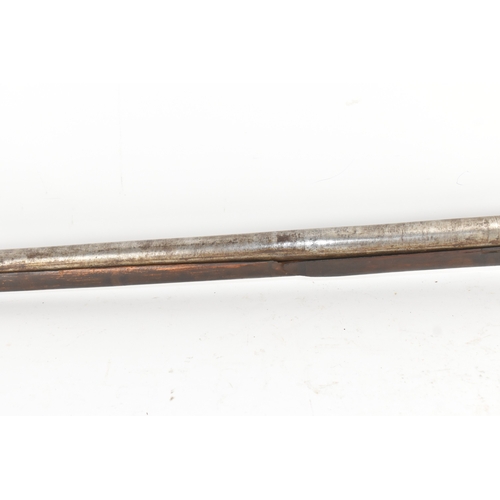 193 - A 19th century Indian toradar matchlock musket, the long steel barrel secured by an iron barrel band... 