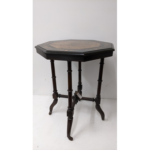 194 - A Victorian Aesthetic Movement ebonised and burr walnut occasional table, the octagonal burr walnut ... 