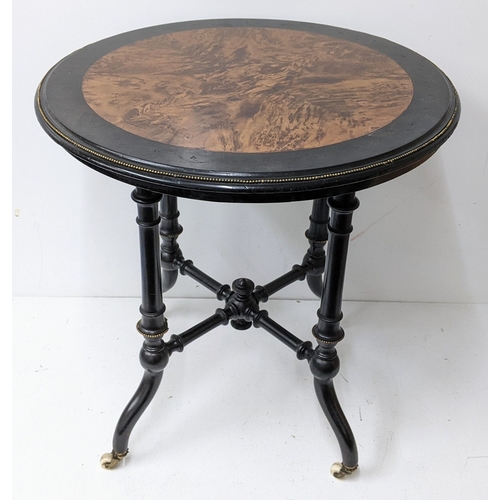 195 - A Victorian Aesthetic Movement ebonised and burr walnut circular occasional table, the circular top ... 