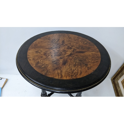 195 - A Victorian Aesthetic Movement ebonised and burr walnut circular occasional table, the circular top ... 