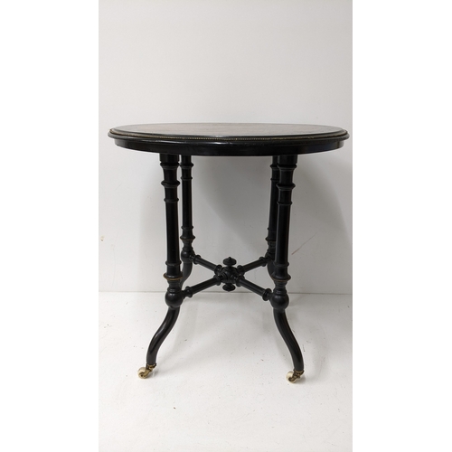 195 - A Victorian Aesthetic Movement ebonised and burr walnut circular occasional table, the circular top ... 