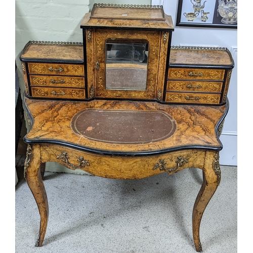 197 - A 19th century French Louis XV style, burr walnut, ebonised and marquetry bonheur-du-jour, with a mi... 
