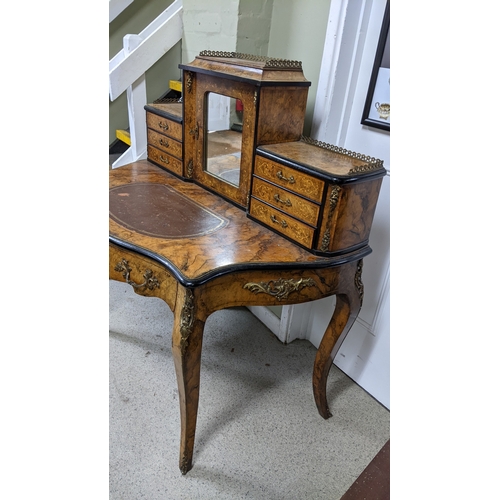 197 - A 19th century French Louis XV style, burr walnut, ebonised and marquetry bonheur-du-jour, with a mi... 